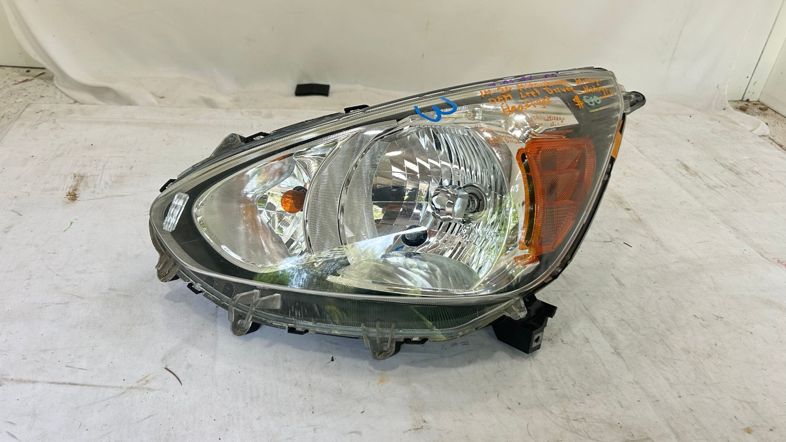 2014-2020 Mitsubishi Mirage Driver side halogen headlight